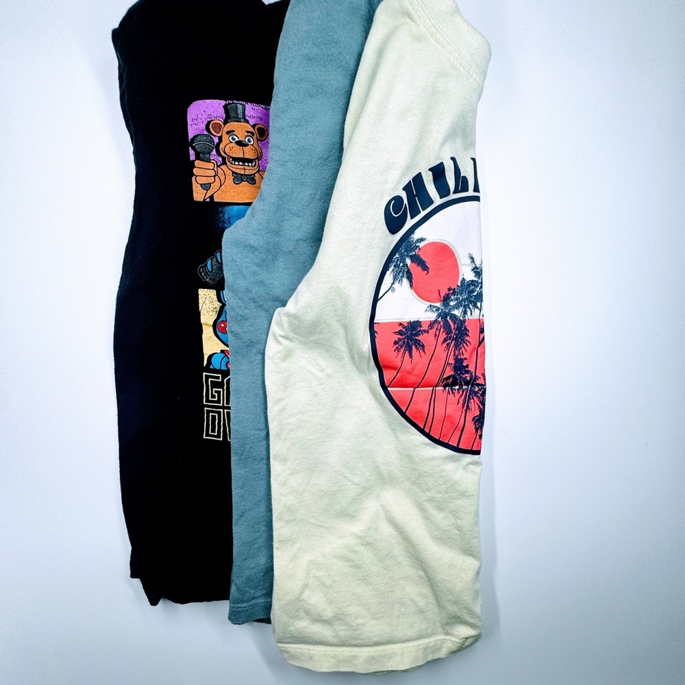 Boy’s graphic t -shirts sizes 8,8A and medium